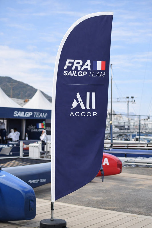 Feather banner vs teardrop banner example at Australian sporting event