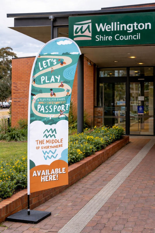 Custom feather banner and teardrop banner used for council promotions and public programs