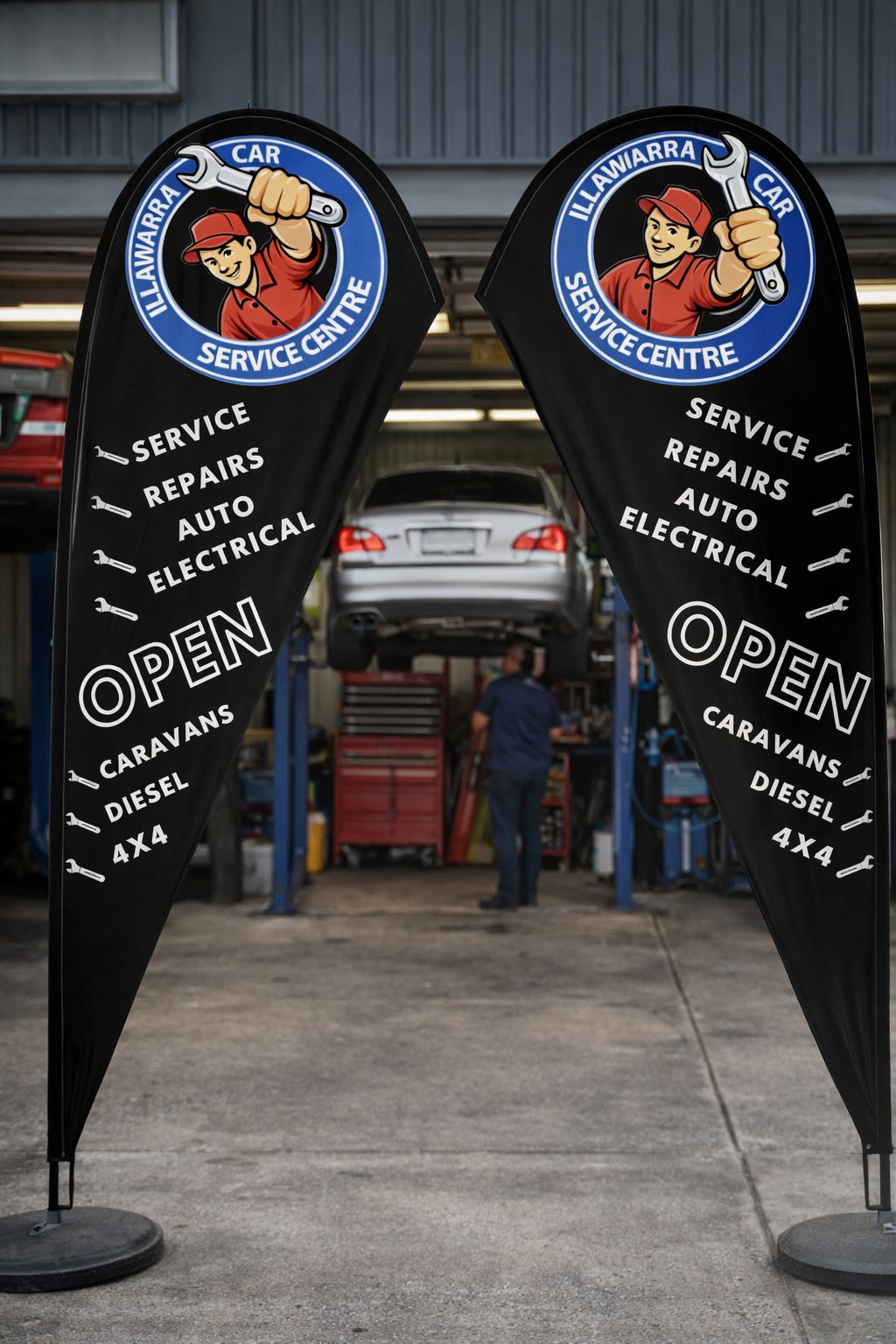 Custom teardrop banners outside vehicle service centre in Sydney for outdoor branding