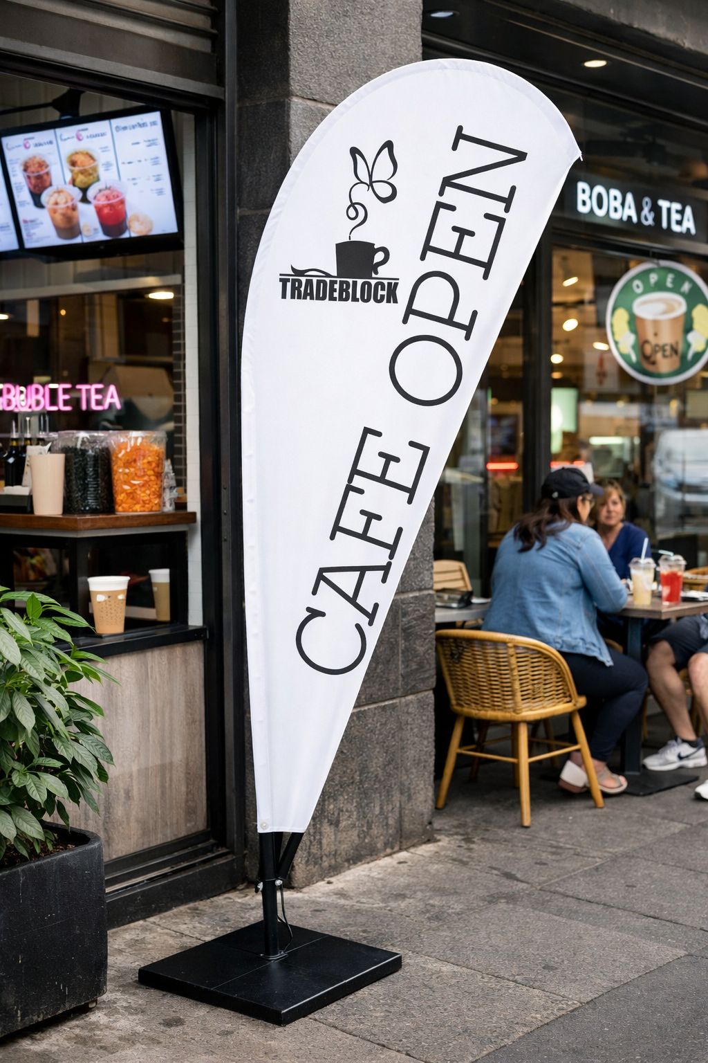 Custom teardrop banner Sydney cafe advertising flags street display