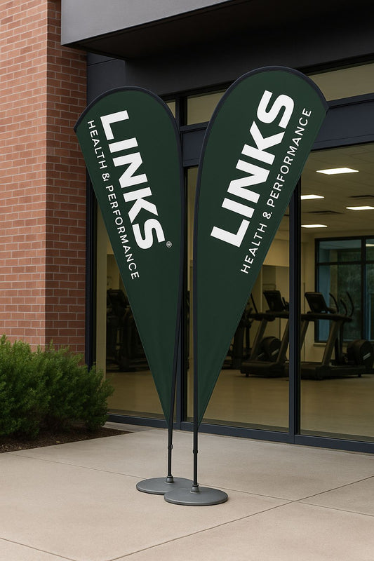 Custom teardrop flags displayed outside Australian fitness clinic