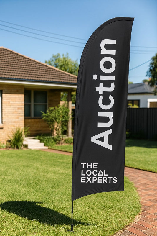 black auction feather banner for real estate agents